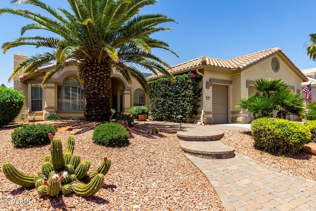 3166 N 158th Ave, Goodyear, AZ 85395 - view of front of home featuring stucco siding, a tile roof, and a garage
