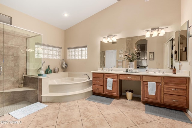 3166 N 158th Ave, Goodyear, AZ 85395 - full bathroom with a garden tub, a stall shower, double vanity, tile patterned floors, and vaulted ceiling