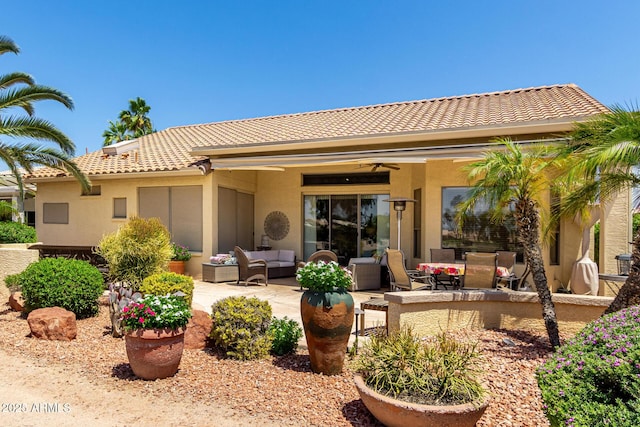 3166 N 158th Ave, Goodyear, AZ 85395 - rear view of house featuring outdoor lounge area, ceiling fan, a patio, and a tiled roof