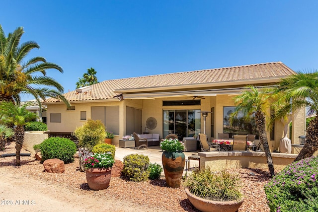 3166 N 158th Ave, Goodyear, AZ 85395 - back of house featuring an outdoor hangout area, a ceiling fan, a patio area, and a tile roof