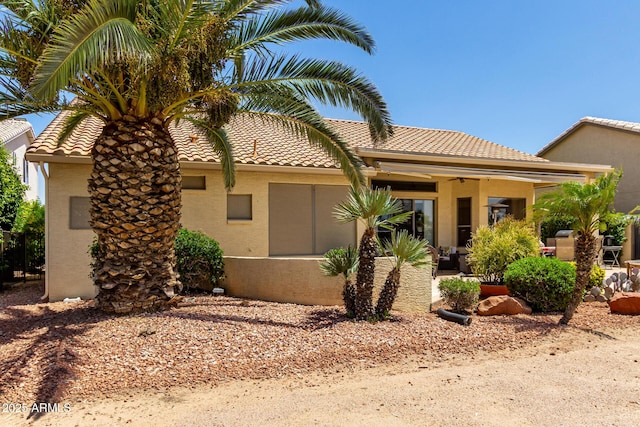 3166 N 158th Ave, Goodyear, AZ 85395 - view of front of house with a tiled roof and stucco siding