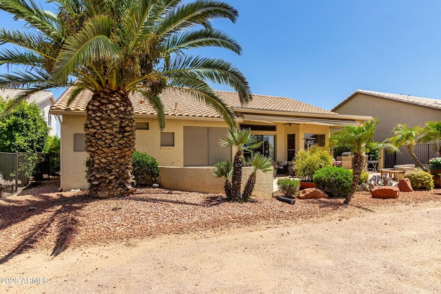 3166 N 158th Ave, Goodyear, AZ 85395 - view of front of home featuring stucco siding and a tiled roof