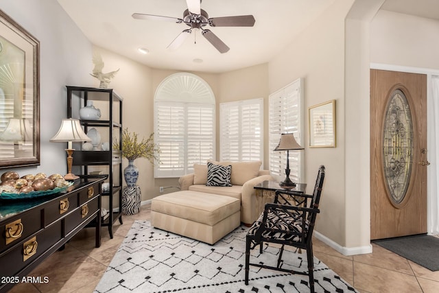 3166 N 158th Ave, Goodyear, AZ 85395 - living room featuring ceiling fan, tile patterned flooring, and arched walkways
