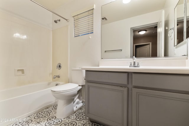 full bathroom featuring vanity, toilet, washtub / shower combination, and tile patterned floors