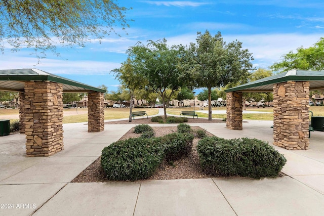 surrounding community featuring a yard and a gazebo