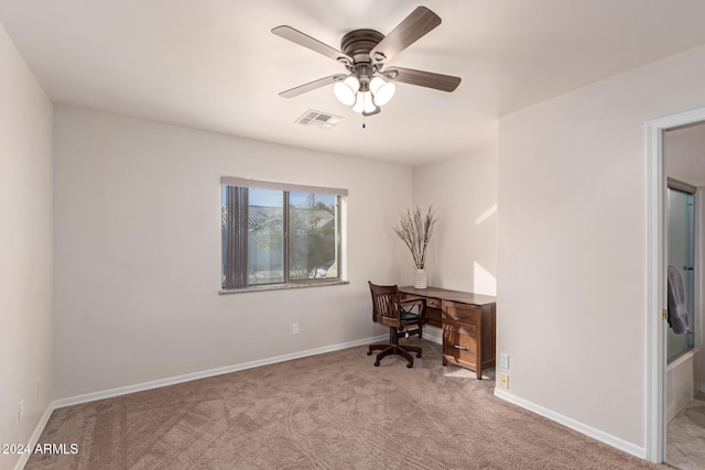 office featuring light carpet and ceiling fan