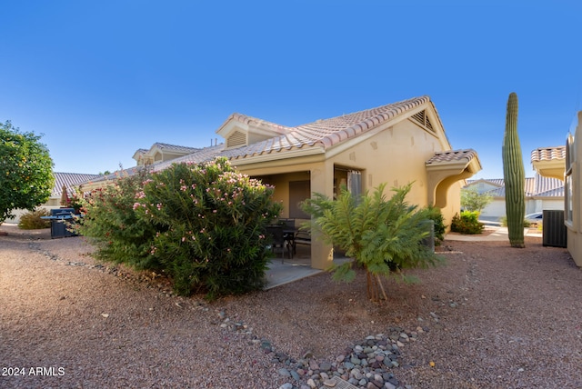 back of house featuring a patio