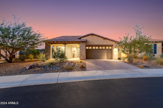 view of front of property featuring a garage