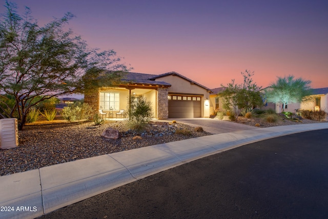 view of front of property with a garage