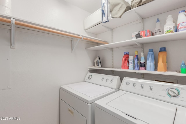 laundry area featuring washing machine and dryer