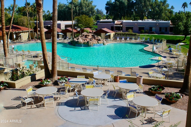 view of pool featuring a patio