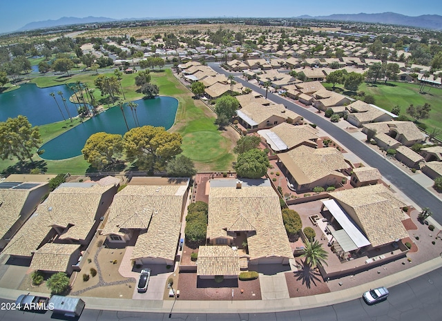 aerial view with a water and mountain view