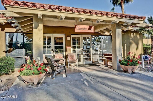 property entrance featuring french doors