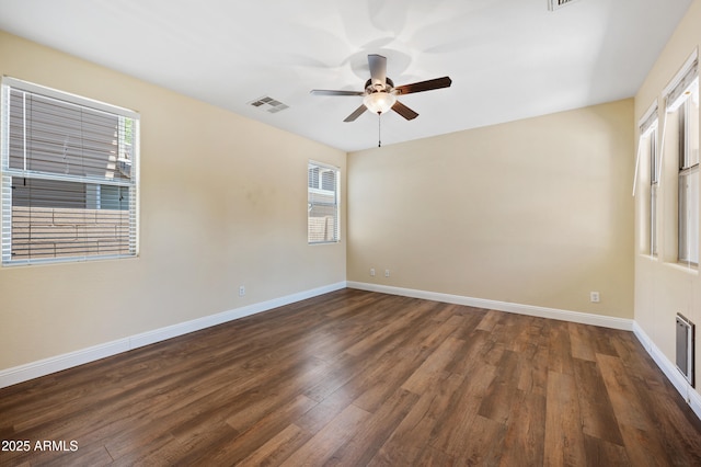 21017 W Edith Way, Buckeye, AZ 85396 - spare room with ceiling fan and dark wood-style floors