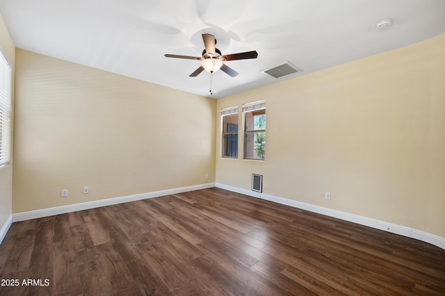 21017 W Edith Way, Buckeye, AZ 85396 - empty room with a ceiling fan, dark wood-style flooring, and a smoke detector