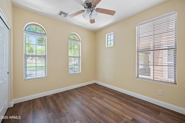 21017 W Edith Way, Buckeye, AZ 85396 - unfurnished room featuring dark wood-style floors and ceiling fan