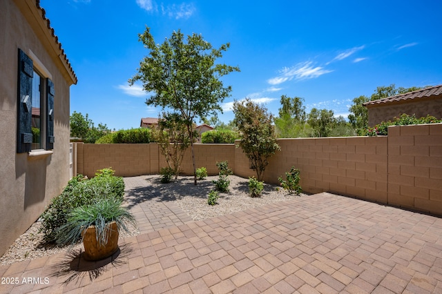 21017 W Edith Way, Buckeye, AZ 85396 - fenced backyard with a patio area