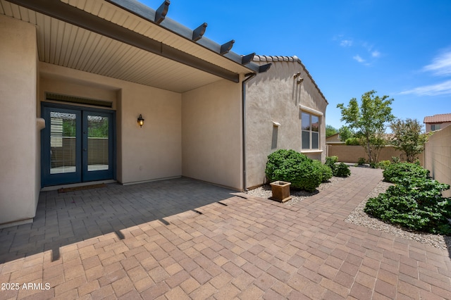 21017 W Edith Way, Buckeye, AZ 85396 - fenced backyard with french doors and a patio area