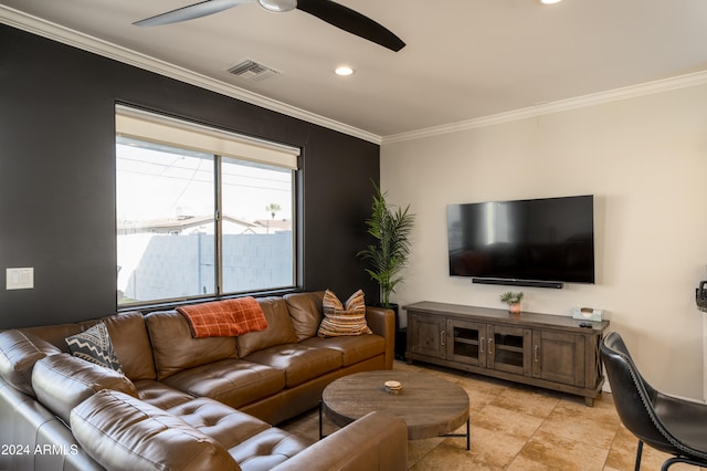 living room with ceiling fan and crown molding