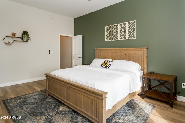 bedroom with light wood-type flooring