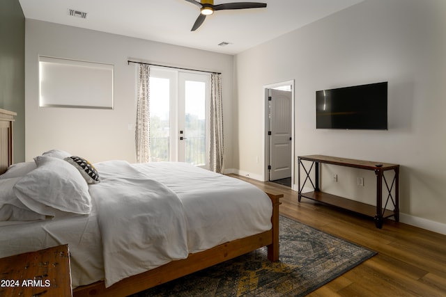 bedroom featuring dark wood-type flooring and ceiling fan