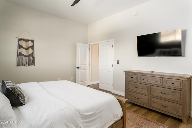 bedroom featuring wood-type flooring and ceiling fan