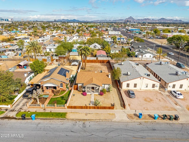 bird's eye view with a residential view and a mountain view