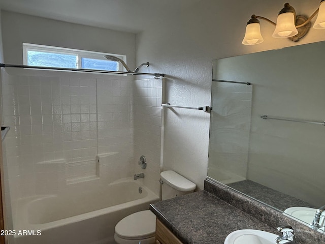 full bathroom featuring shower / bathing tub combination, toilet, and vanity