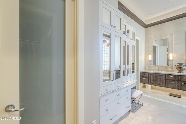 8248 E Arroyo Hondo Rd, Scottsdale, AZ 85266 - bathroom with tile patterned flooring, vanity, and tasteful backsplash