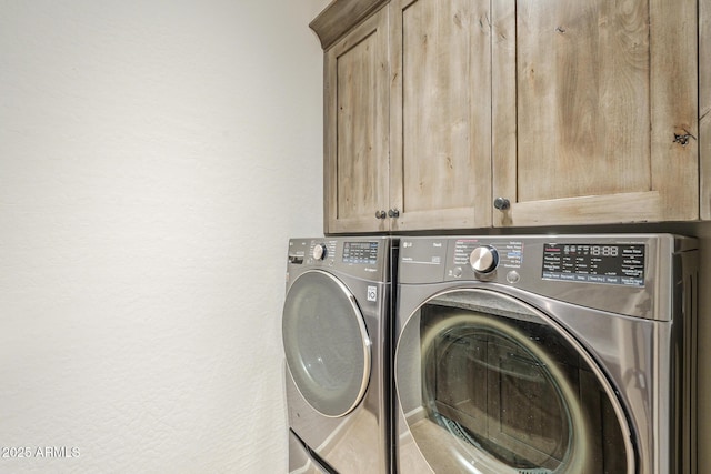 8248 E Arroyo Hondo Rd, Scottsdale, AZ 85266 - washroom with cabinet space and washer and clothes dryer
