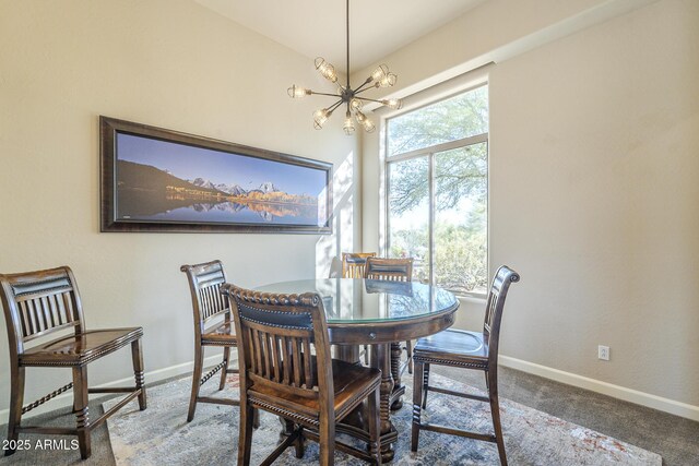 8248 E Arroyo Hondo Rd, Scottsdale, AZ 85266 - dining room featuring a chandelier, baseboards, and carpet floors