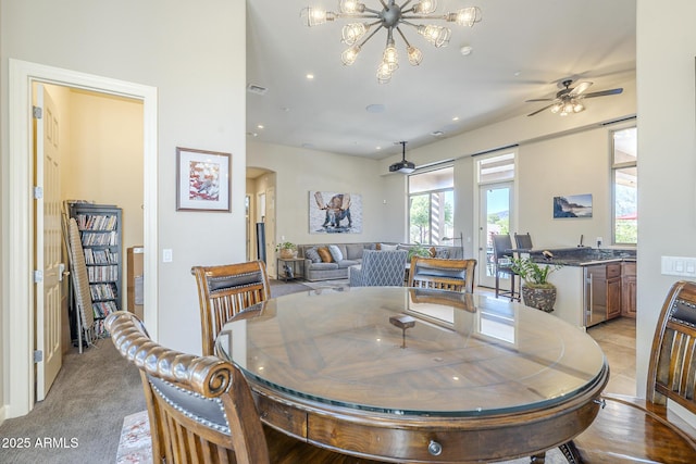8248 E Arroyo Hondo Rd, Scottsdale, AZ 85266 - dining room with a chandelier, recessed lighting, and ceiling fan