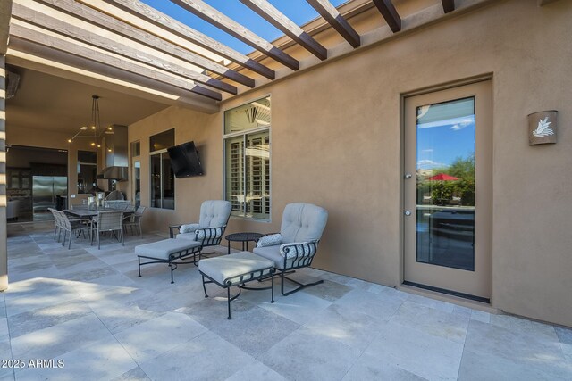 8248 E Arroyo Hondo Rd, Scottsdale, AZ 85266 - view of patio / terrace with a pergola and outdoor dining space