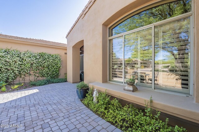 8248 E Arroyo Hondo Rd, Scottsdale, AZ 85266 - property entrance featuring stucco siding and a patio