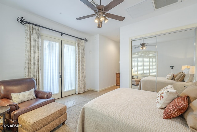 8248 E Arroyo Hondo Rd, Scottsdale, AZ 85266 - bedroom with access to outside, light tile patterned floors, baseboards, ceiling fan, and a closet