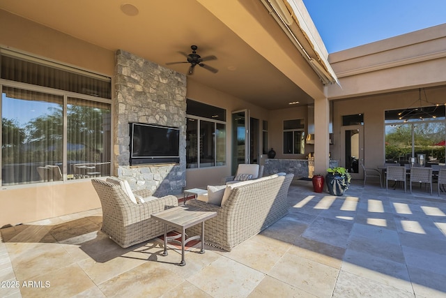 8248 E Arroyo Hondo Rd, Scottsdale, AZ 85266 - view of patio / terrace with outdoor dining space and a ceiling fan