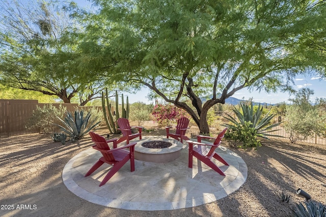 8248 E Arroyo Hondo Rd, Scottsdale, AZ 85266 - view of patio featuring a fire pit and a fenced backyard