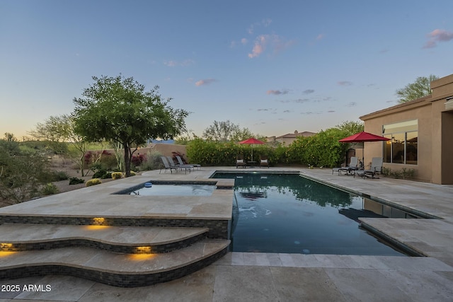 8248 E Arroyo Hondo Rd, Scottsdale, AZ 85266 - view of pool with a patio and an in-ground hot tub