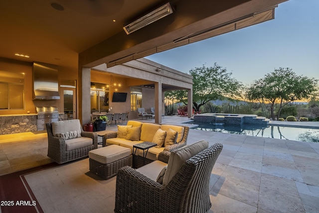 8248 E Arroyo Hondo Rd, Scottsdale, AZ 85266 - view of patio featuring exterior kitchen, outdoor lounge area, outdoor dining space, and a pool with connected hot tub