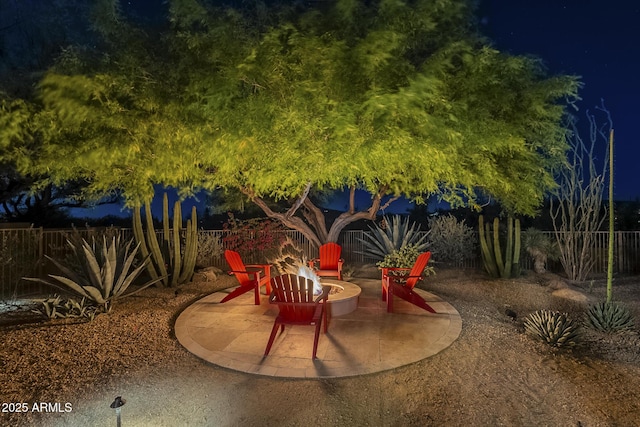 8248 E Arroyo Hondo Rd, Scottsdale, AZ 85266 - view of patio / terrace with a fire pit and a fenced backyard