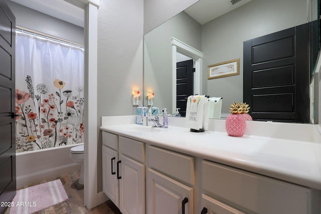 bathroom featuring visible vents, shower / bath combination with curtain, vanity, and toilet