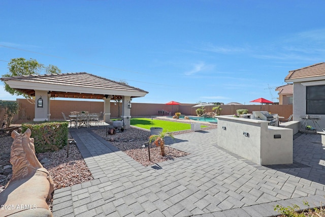 view of patio featuring a fenced in pool, area for grilling, a fenced backyard, a gazebo, and outdoor dining space