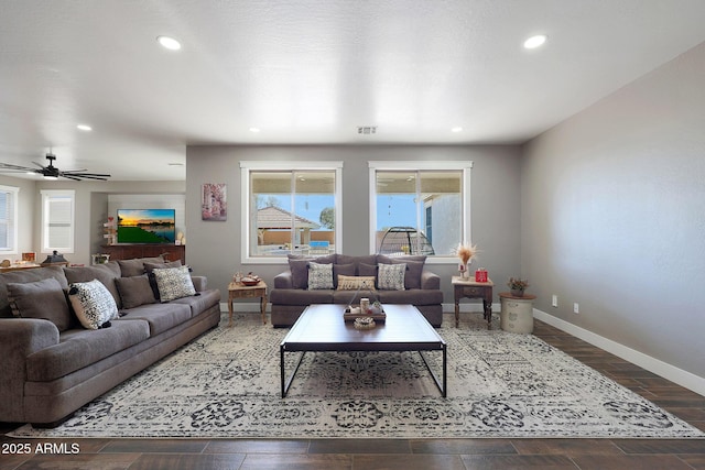 living area featuring baseboards, visible vents, a ceiling fan, wood finished floors, and recessed lighting