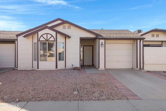 ranch-style home with a garage