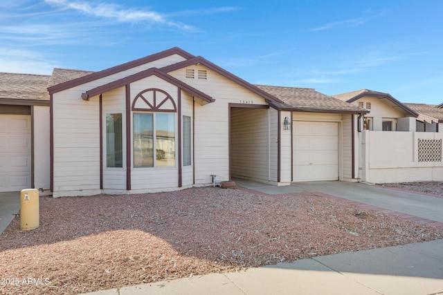 view of front of property with a garage