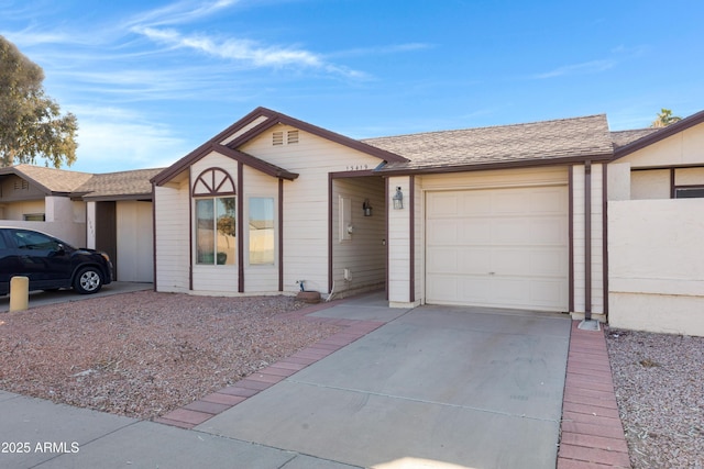 ranch-style house with a garage