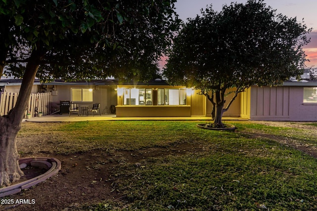 exterior space with a yard and a patio