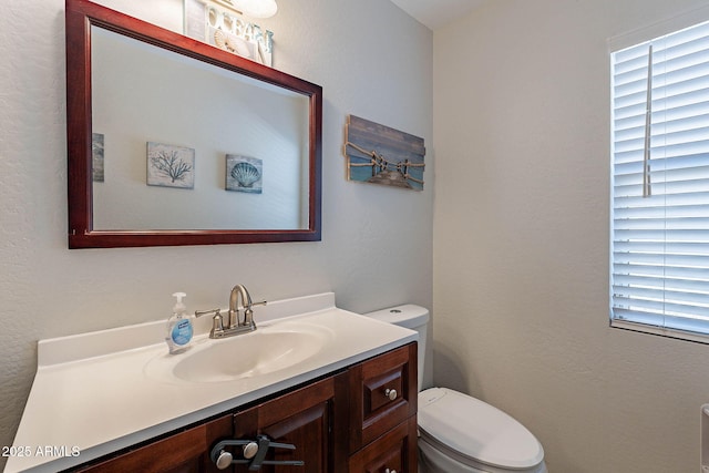 5305 E Silverbell Rd, San Tan Valley, AZ 85143 - half bathroom featuring toilet and vanity