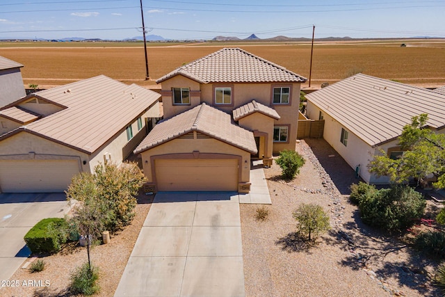 5305 E Silverbell Rd, San Tan Valley, AZ 85143 - view of front of home featuring driveway, stucco siding, a tile roof, an attached garage, and a mountain view