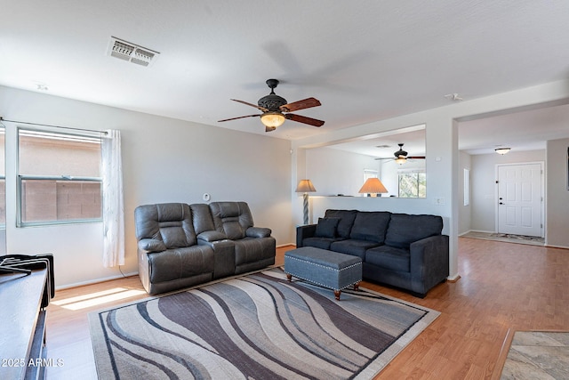 5305 E Silverbell Rd, San Tan Valley, AZ 85143 - living area with ceiling fan and light wood-style floors